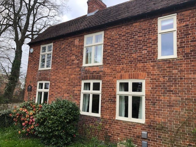 Vacuum glazing installed in herigate windows