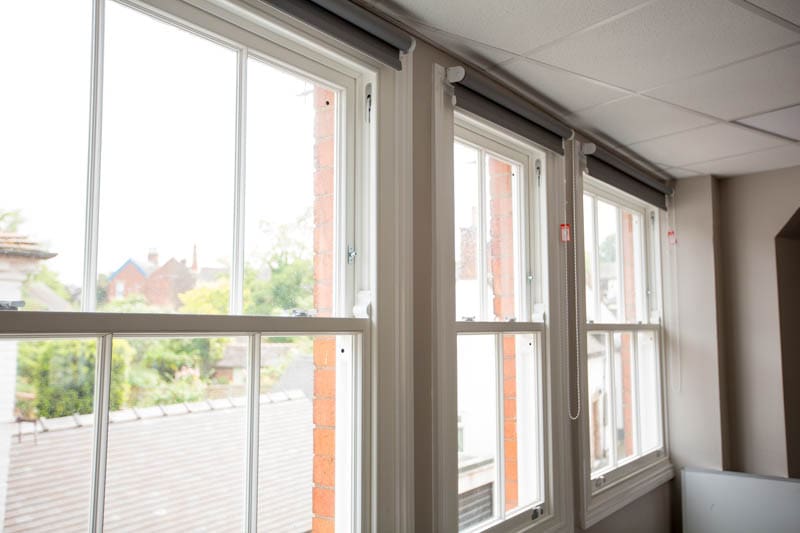 Vacuum glazed sash windows in Derbyshire school, internal shot with soft lighting